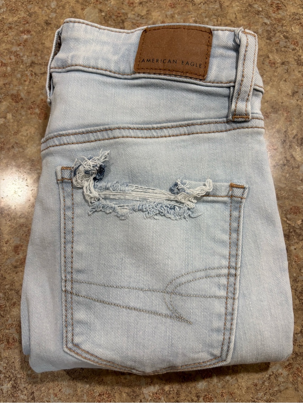 American Eagle Outfitters Light Blue Skinny Jeans with Back-Pocket Distress